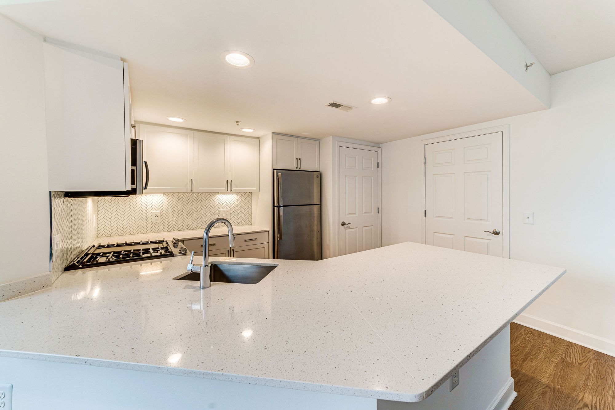 10X Mizner Park renovated kitchen with quartz island